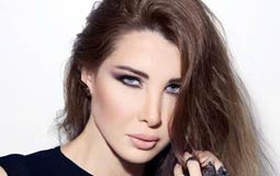 بالصور- نانسي عجرم تستمتع بوقتها في دبي.. ابنتيها ترفضان هذا الأمر