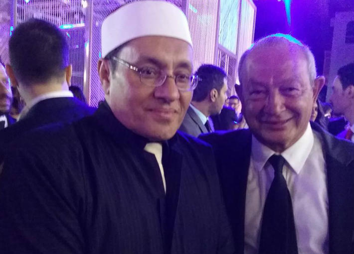 نجيب ساويرس ومصطفى راشد