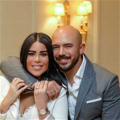 محمود العسيلي وزوجته أمنية عبد المنعم