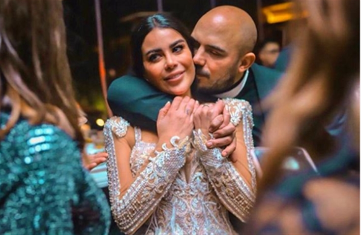  محمود العسيلي وزوجته 