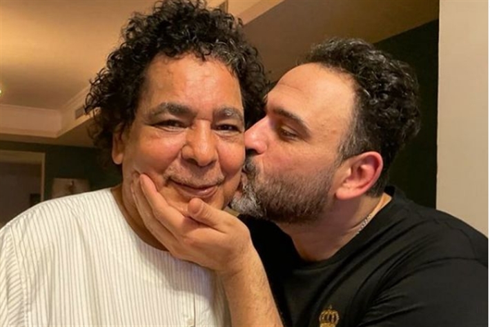 أكرم حسني ومحمد منير