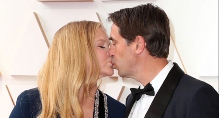 إيمي شومر وزوجها كريس فيشر