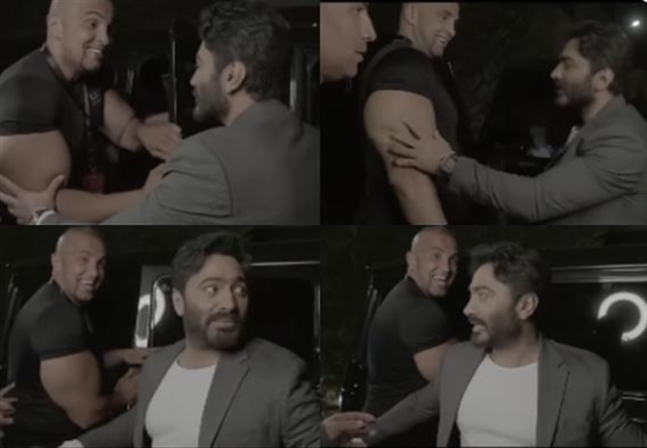 تامر حسني مع حارسه الشخصي