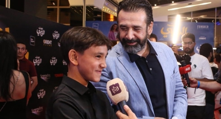 كريم عبد العزيز ونجله علي