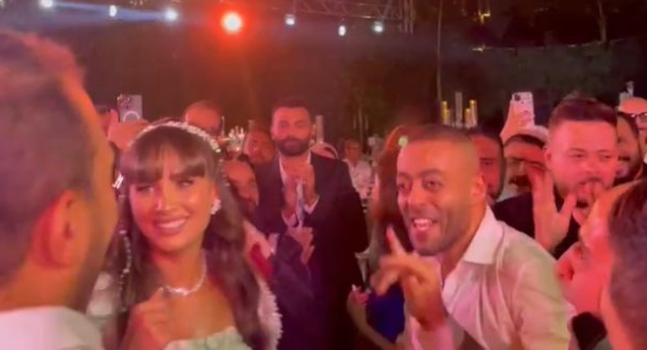 تامر عاشور ونانسي نور في زفافهما