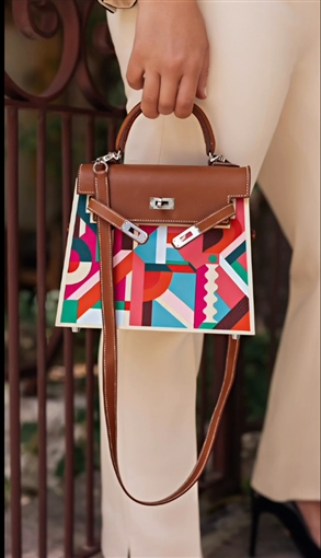  شرطة_الموضة: جومانا مراد بإطلالة مليونية في أحدث جلسة تصوير بدلة من Prada وحقيبة إصدار محدود من Herm s