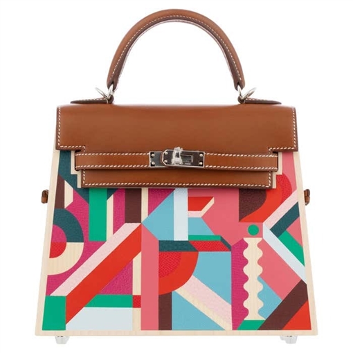  شرطة_الموضة: جومانا مراد بإطلالة مليونية في أحدث جلسة تصوير بدلة من Prada وحقيبة إصدار محدود من Herm s