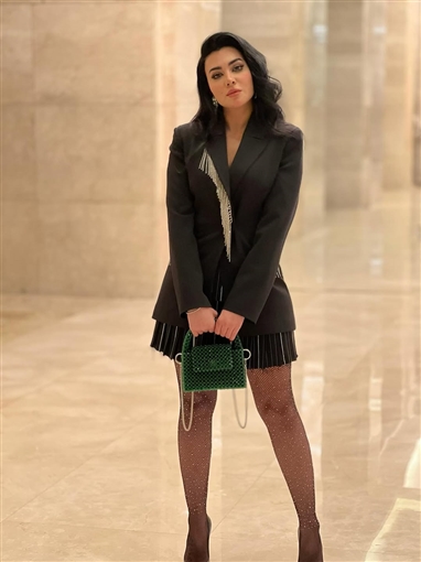 ميرهان حسين تستعرض تفاصيل إطلالتها في حفل ألبوم مي فاروق