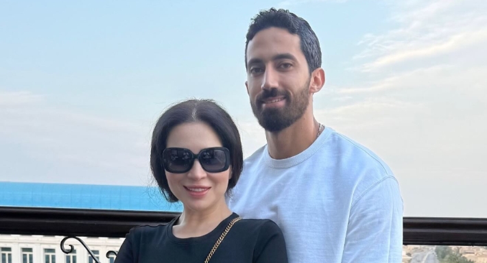 مي عز الدين وزوجها