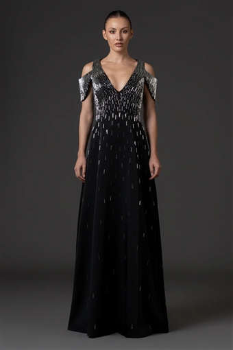  شرطة_الموضة: نانسي عجرم بفستان أسود طويل في حفلها بدبي ... سعره 258 ألف جنيها