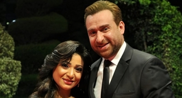 نضال الشافعي وزوجته