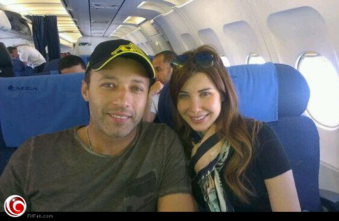 نانسي وفهمي في الطائرة