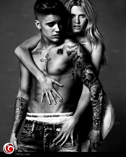 جستين بيبر مع لارا ستون في حملة &quot;كالفين كلاين&quot; الإعلانية