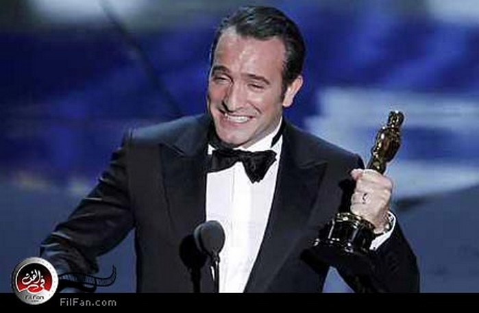 جان دوجاردان أثناء تسلمه الجائزة