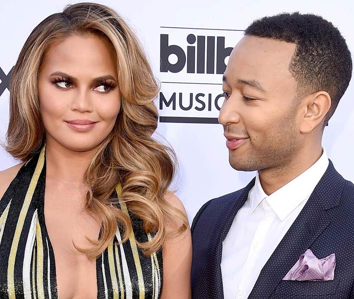 جون لجند وزوجته كريسي تيجان