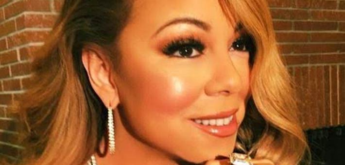 ماريا كاري تستعرض خاتم خطوبتها الماسي