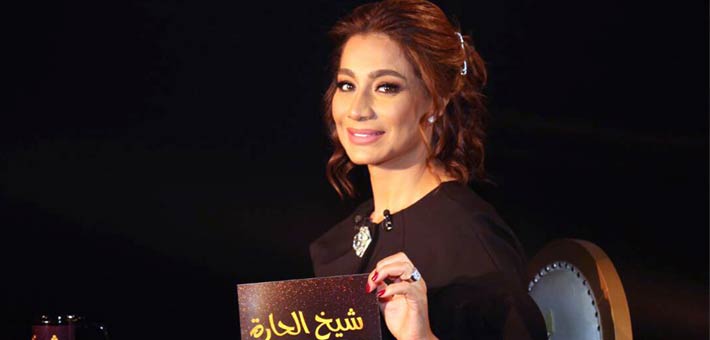 بسمة أثناء التصوير