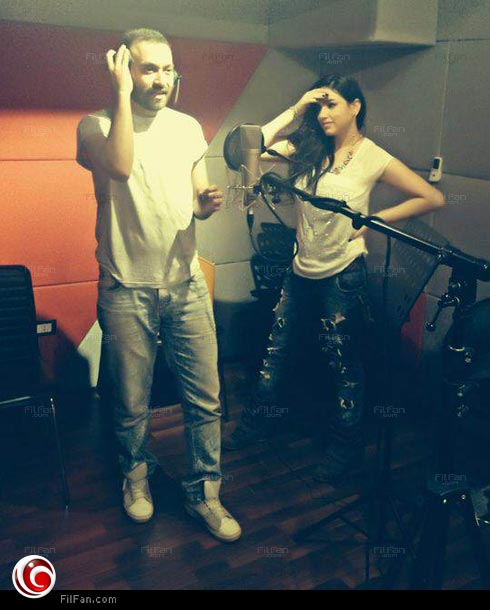 مروة نصر وكريم محسن أثناء التسجيل 