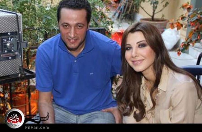 نانسي عجرم مع المخرج وليد ناصيف أثناء تصوير الكليب