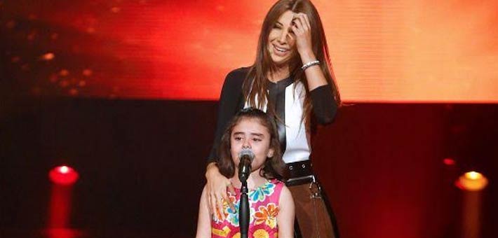 نانسي عجرم تحاول التخفيف عن غنى