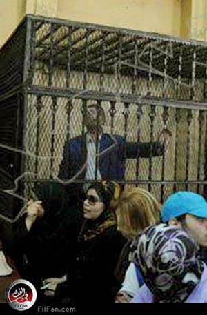 عكاشة في قفص الاتهام