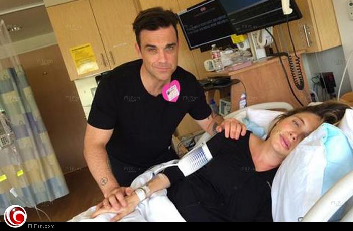 روبي وليامز يساند زوجته قبل وضعها لطفلهما الثاني