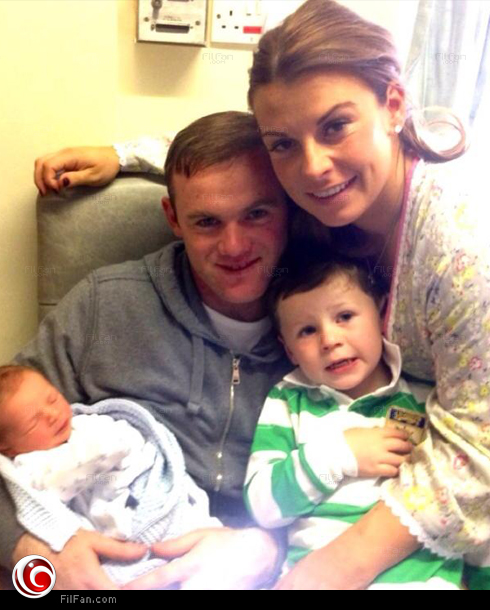 واين وكولين روني مع طفلهما الثاني كلاي 