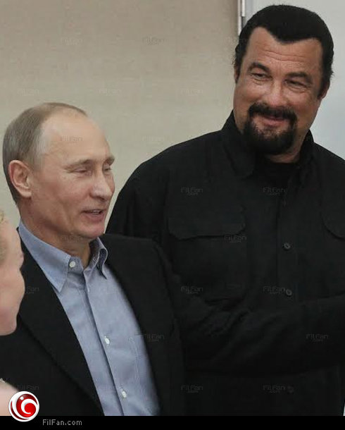 ستيفن سيجال مع الرئيس الروسي فلاديمير بوتين