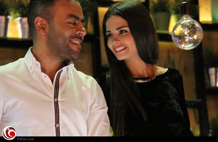 تامر عاشور مع الموديل نيللي بيطار