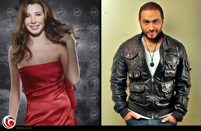 تامر ونانسي يغنيان في الصالة المغطاة