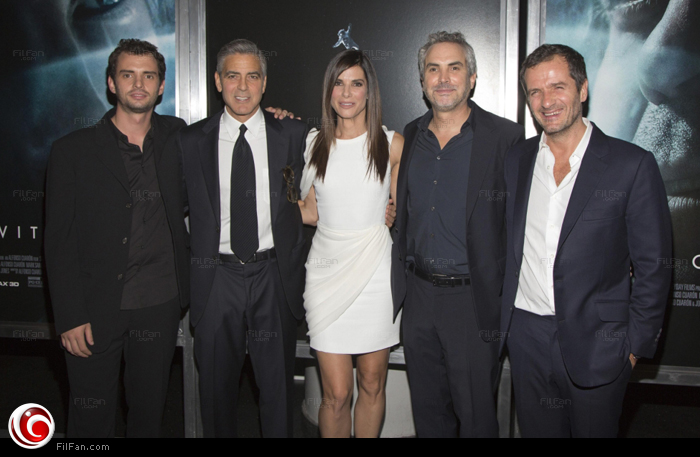 ساندرا بولوك وجورج كلوني مع المخرج ألفونسو كوارون