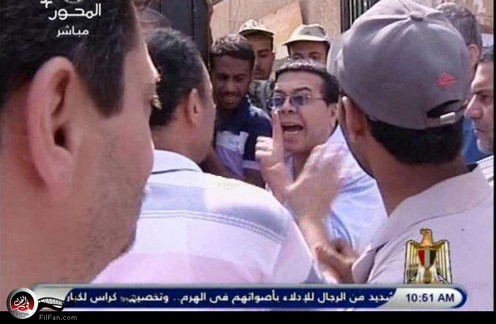 آدم أثناء التصويت (صورة من قناة المحور)