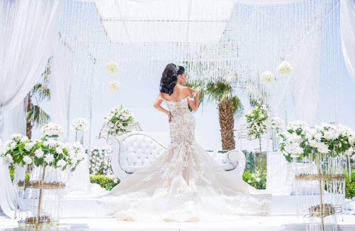 غادة عبد الرازق مبهرة بفستان زفاف من تصميم هاني البحيري في ...