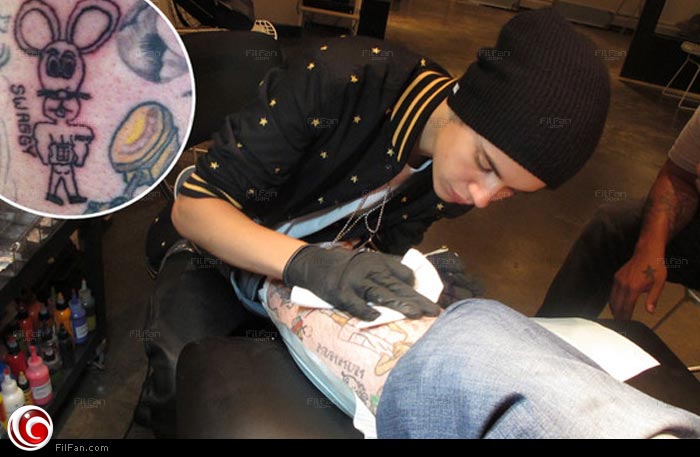 جاستن بيبر يوشم بانج بانج في يونيو الماضي