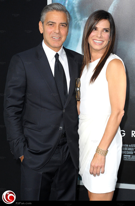 ساندرا بولوك مع جورج كلوني في افتتاح Gravity 