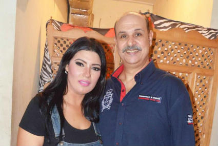 عزة مجاهد وزوجها