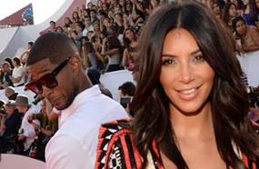 أشر ينظر على كيم كاردشيان على السجادة الحمراء لحفل &quot;MTV&quot;