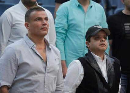 هنيدي ودياب أثناء النشيد الوطني