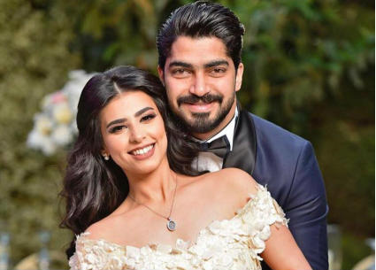 مينا عطا وزوجته