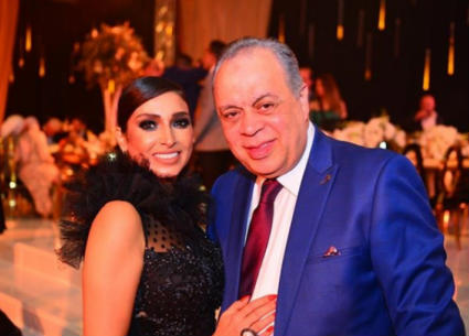 أشرف زكي وروجينا