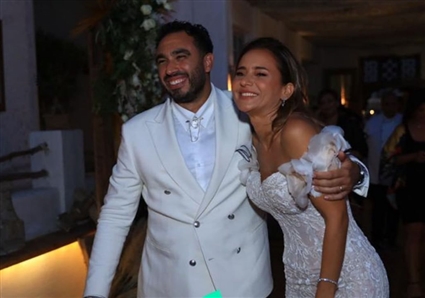 نيللي كريم وهشام عاشور