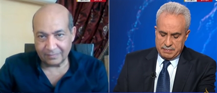 طارق الشناوي ومذيع الجزيرة محمد كريشان