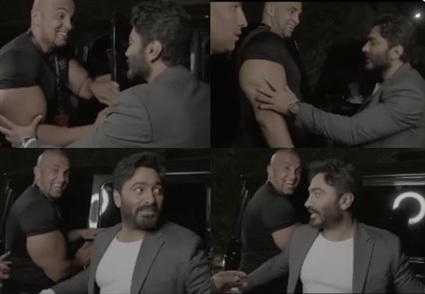 تامر حسني مع حارسه الشخصي