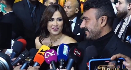 ياسمين عبد العزيز وأحمد العوضي