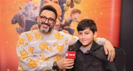 أكرم حسني وابنه