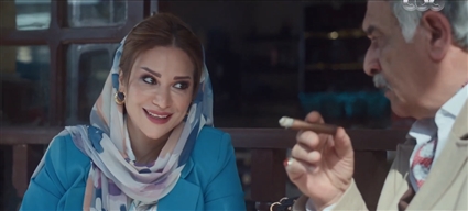 غادة طلعت مع رياض الخولي في مشهد من مسلسل (قهوة المحطة)