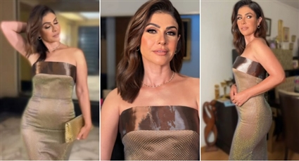 بسمة بفستان أخضر فاتح بلا أكمام في حفل زفاف رنا رئيس من تصميم أيمن لحموني