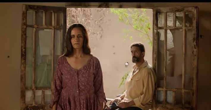 ريم حجاب وخالد كمال في مشهد من فيلم "نهار عابر"