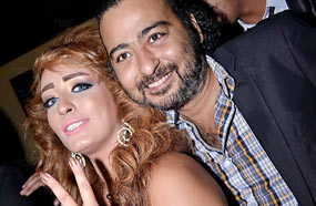 عزمي مع الممثلة نهى عادل