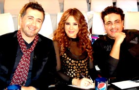 رحيم مع كارول في كواليس XFactor